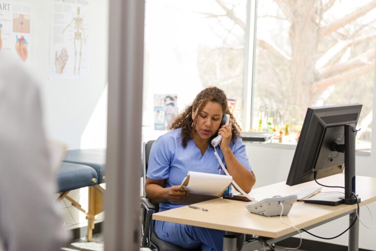 nurse on phone in a medical office